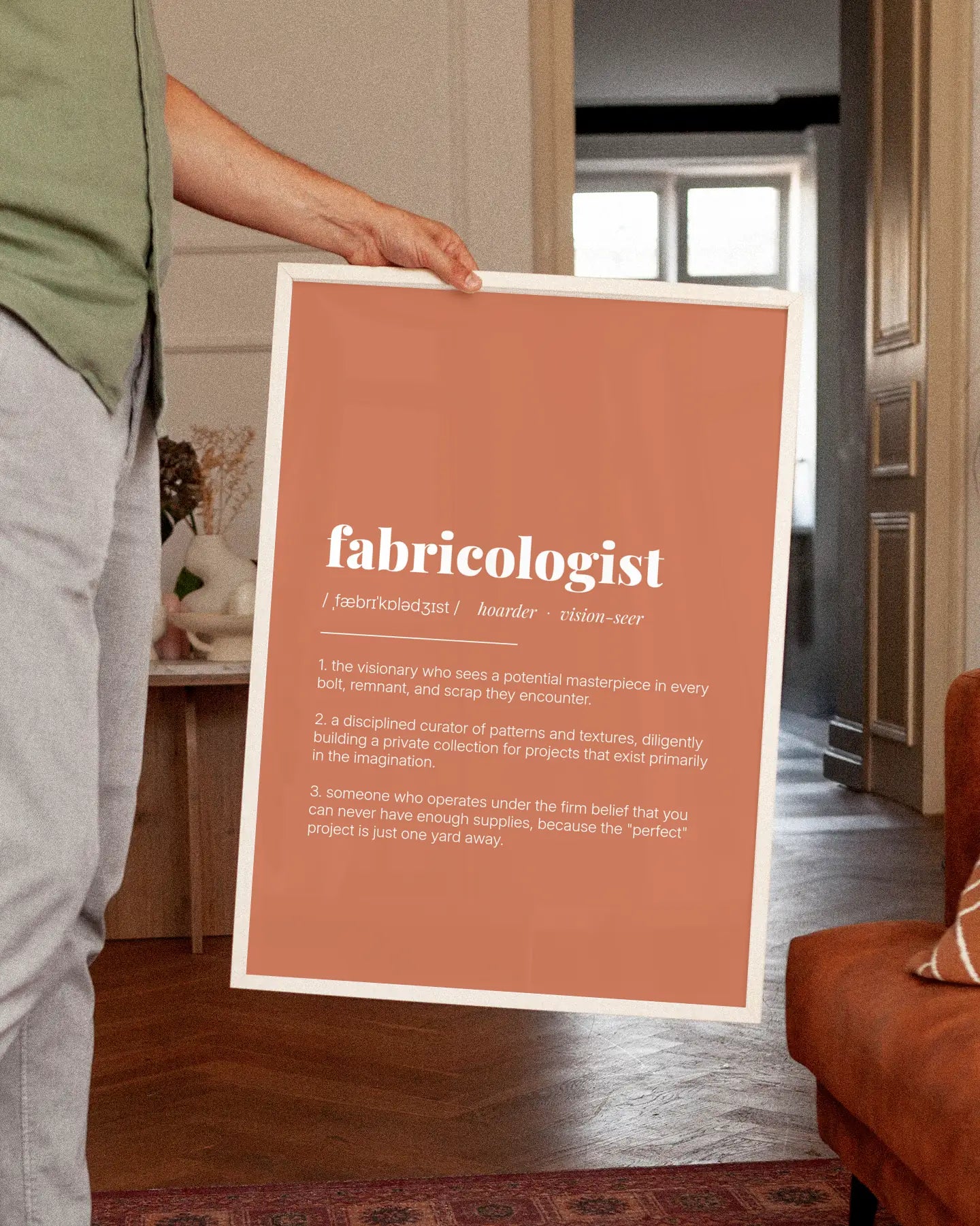 Definition Poster of Fabricologist on Terracotta background